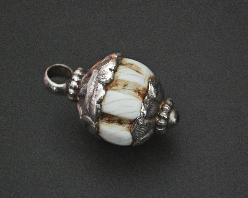 Nepali Shell Repoussee Silver Pendant