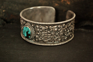 Fabulous Nepali Turquoise Repoussee Bracelet with Eight Auspicious Symbols