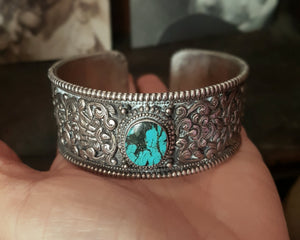 Fabulous Nepali Turquoise Repoussee Bracelet with Eight Auspicious Symbols